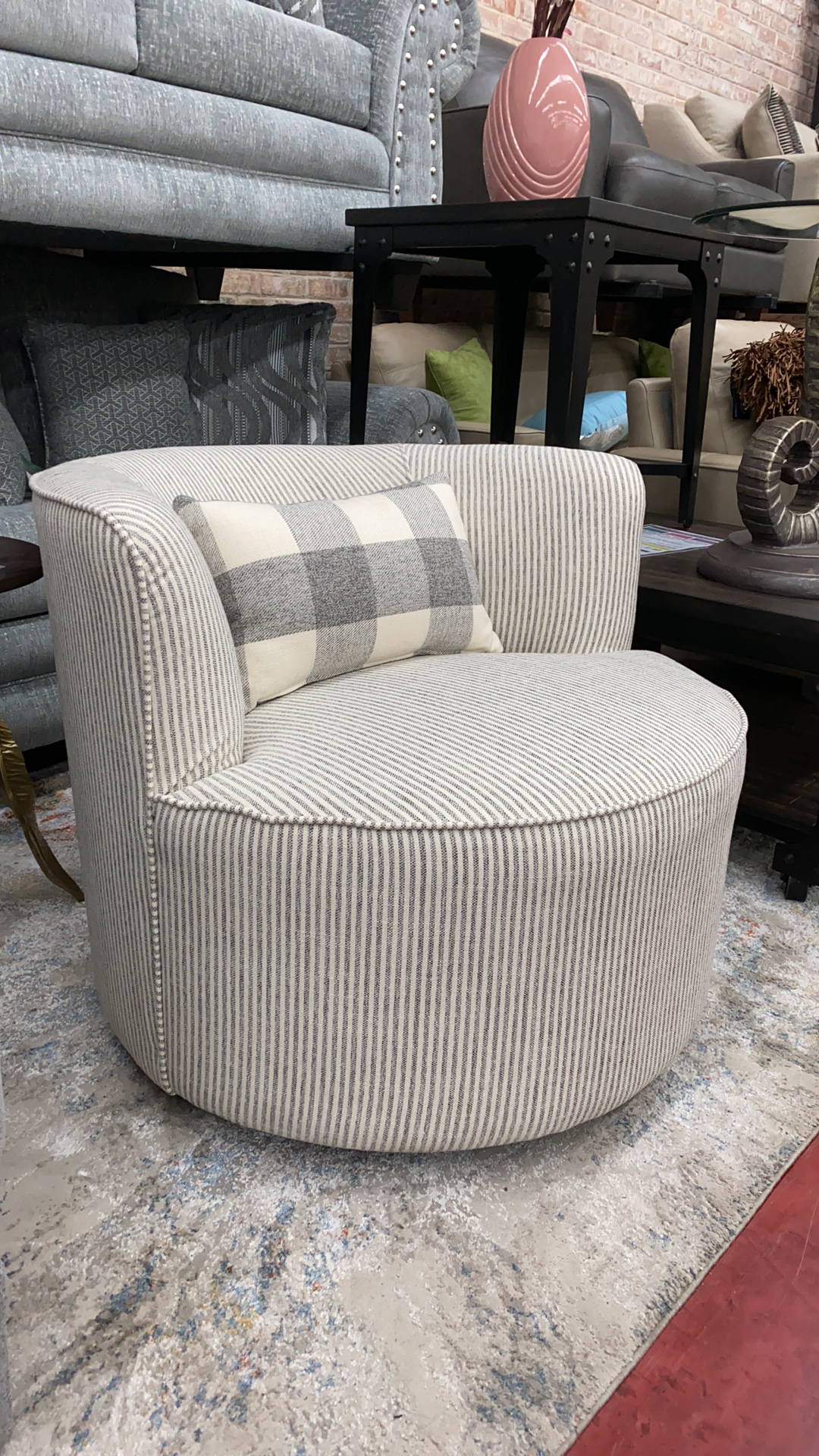 WEEKLY or MONTHLY. Benzley Grey Swivel Barrel Chair